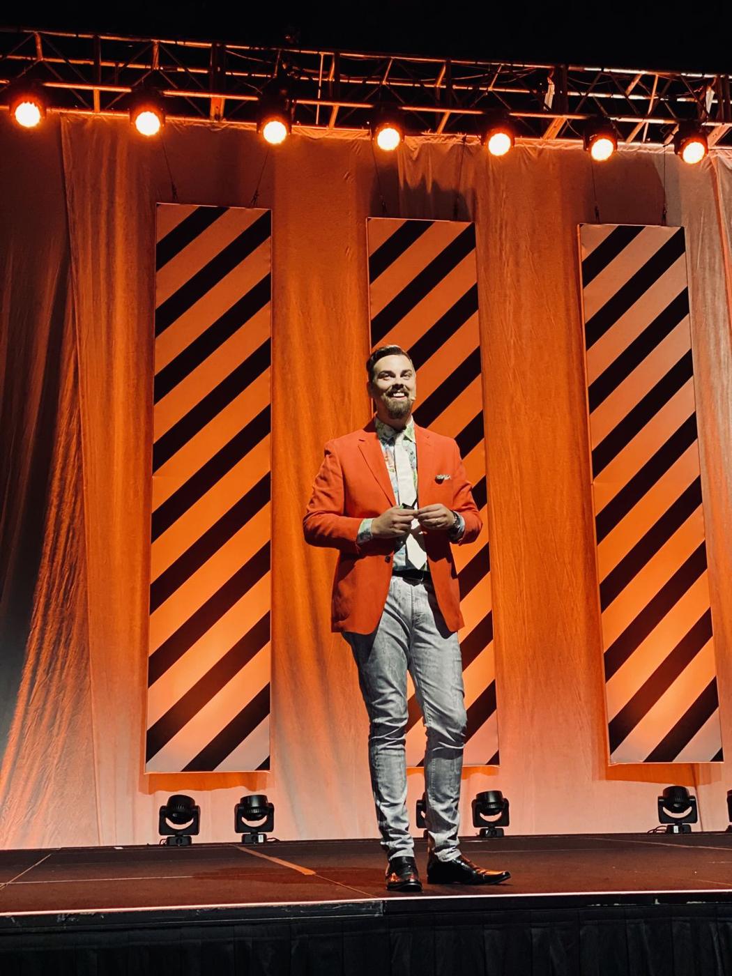 Geoff speaking on stage