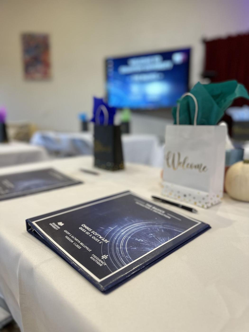 The welcome table with training manuals
